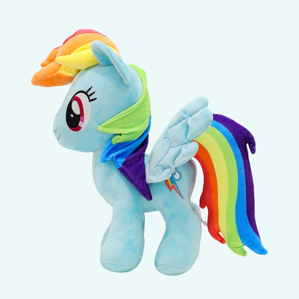 Img_09_2025_Peluche_Poupée_Licorne_Bleue_1 Unicorn doll plush in blue on a very light blue background.