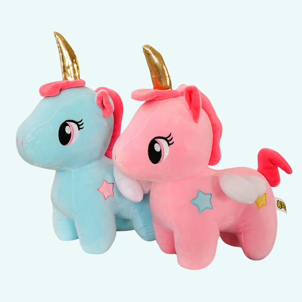 Blue unicorn plush with golden horn on a light blue background.