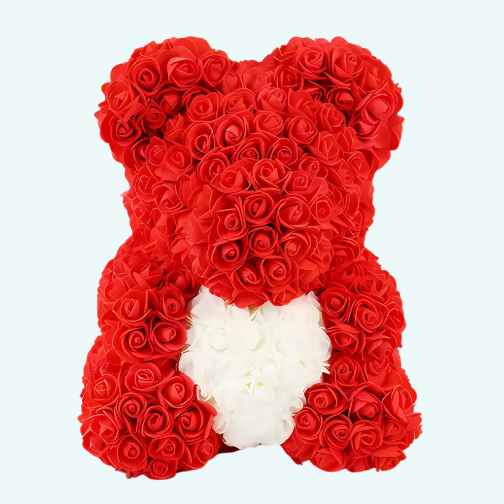 Teddy bear red roses collector's box ona light blue background.