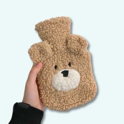 Cute bear boiling water teddy on a light blue background.