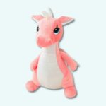 Cute pink dragon plush on a light blue background.