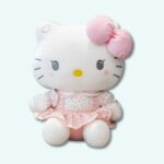 Cute hello kittu plush on light blue background.