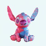 Stitch, the hero of the Disney cartoon, is half coloured in light blue and the other half in pink. He is sitting with his ears in the air