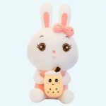Bubble tea plush in the shape of a white and pink rabbit with a small soda in his hands in beige