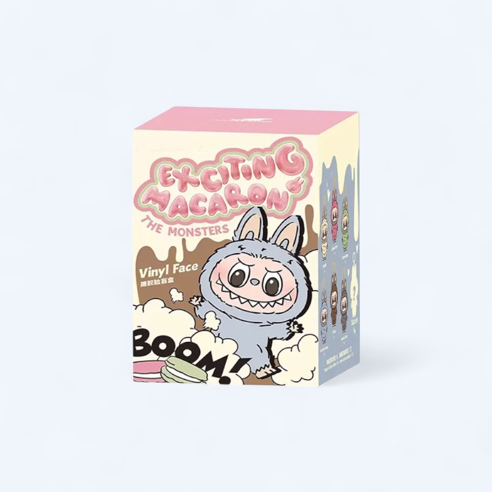 Img_1000X1000_Peluche_Mystere_Labubu_Debout0.Jpg Cardboard box with a gray Labubu drawing and pink and black text