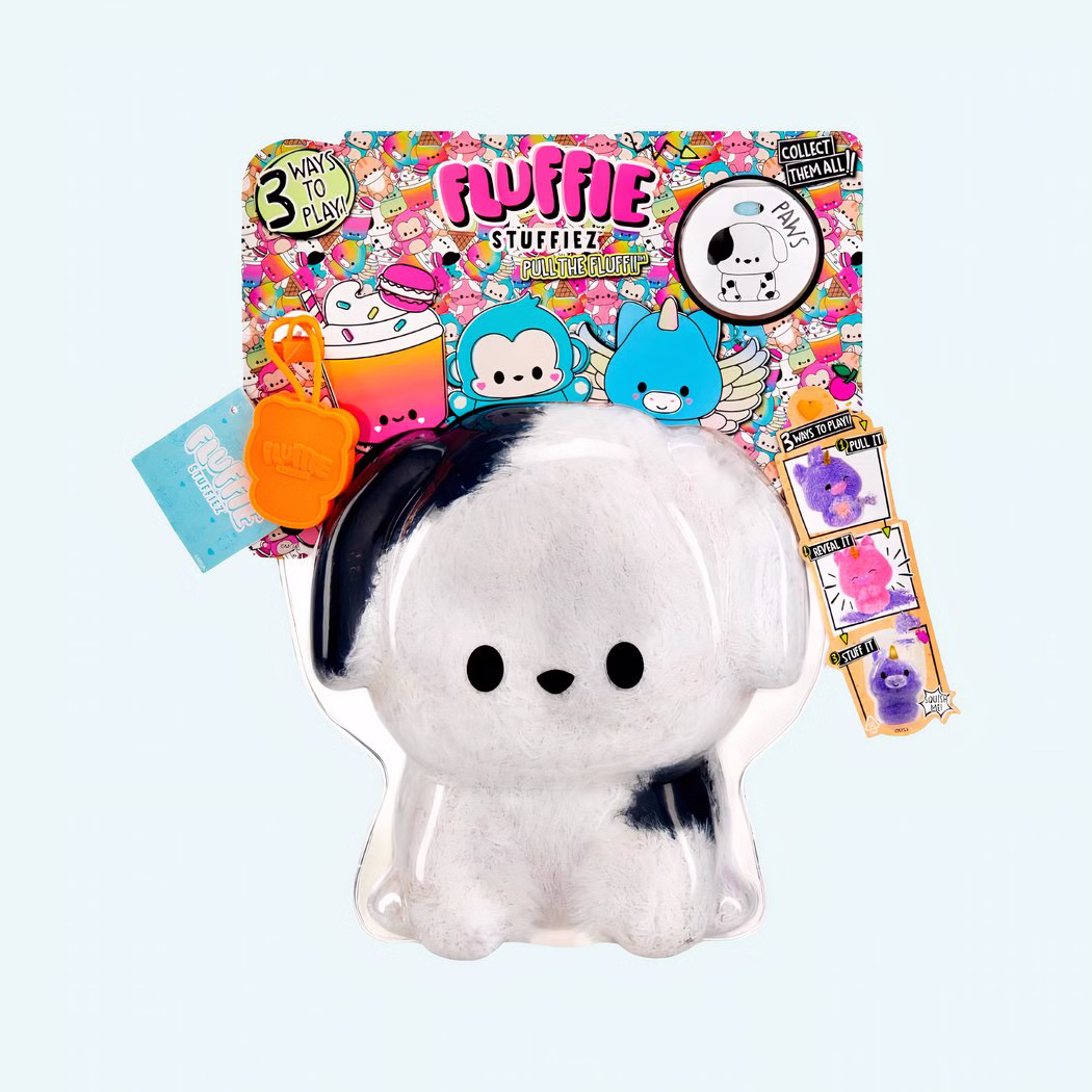 Img_06_2025_Peluche_Fluffie_Stuffiez_Petit_Chien_1.Jpeg Fluffie Stuffiez plush shaped like a cute small black and white dog on a blue background