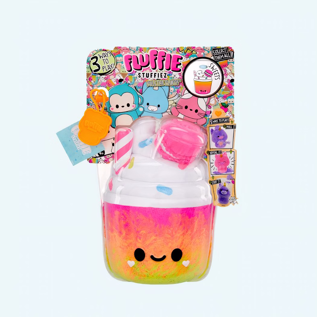 Img_06_2025_Peluche_Fluffie_Stuffiez_Pot_De_Glace_1.Jpeg Fluffie Stuffiez plush shaped like a pink and yellow ice cream cup on a blue background