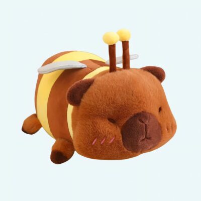 Capybara plush dressed as a bee on a white background