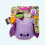 Fluffie Stuffiez Halloween Edition plush shaped like a purple bat on a white background