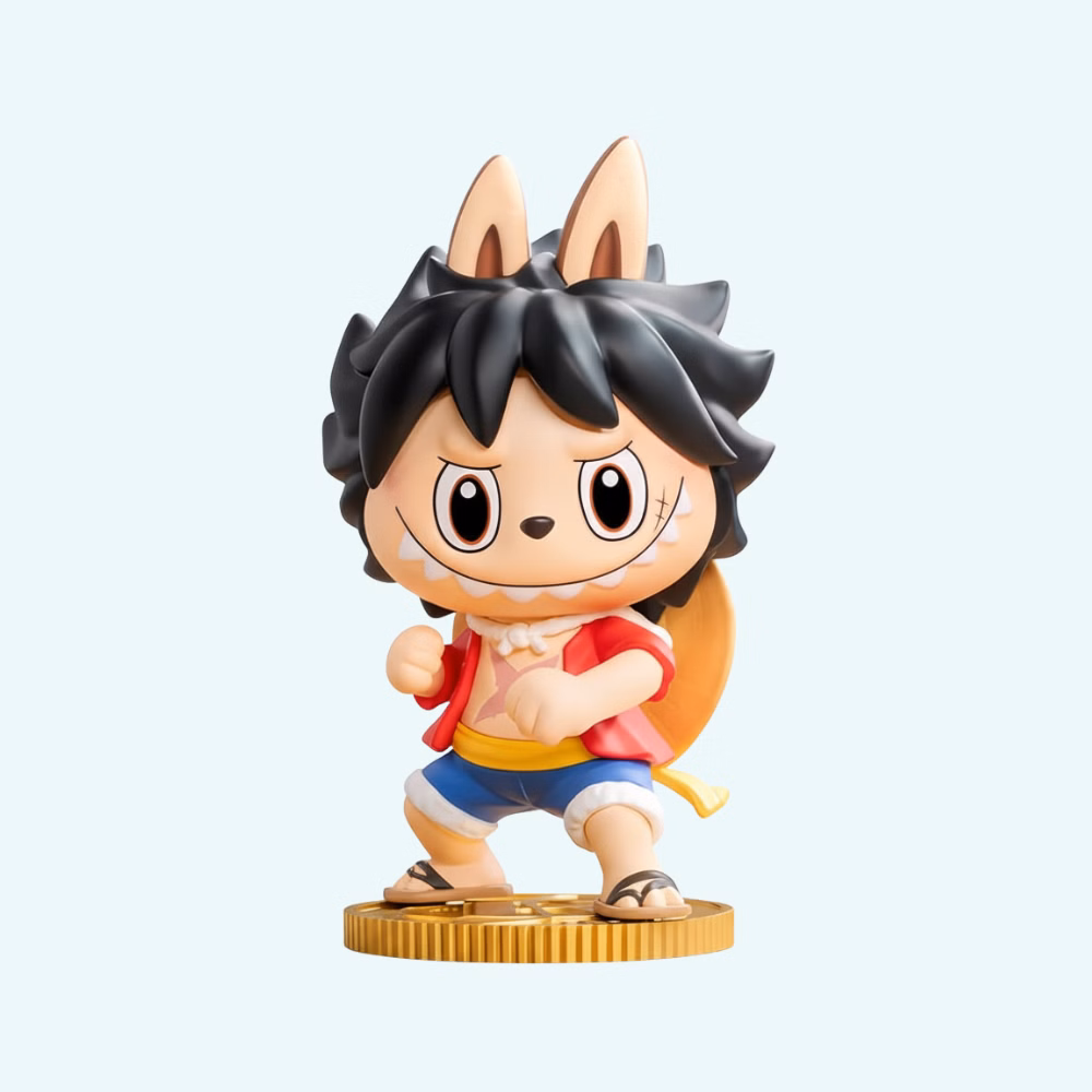 Monkey D. Luffy figure from One Piece in cute Labubu style on light blue background